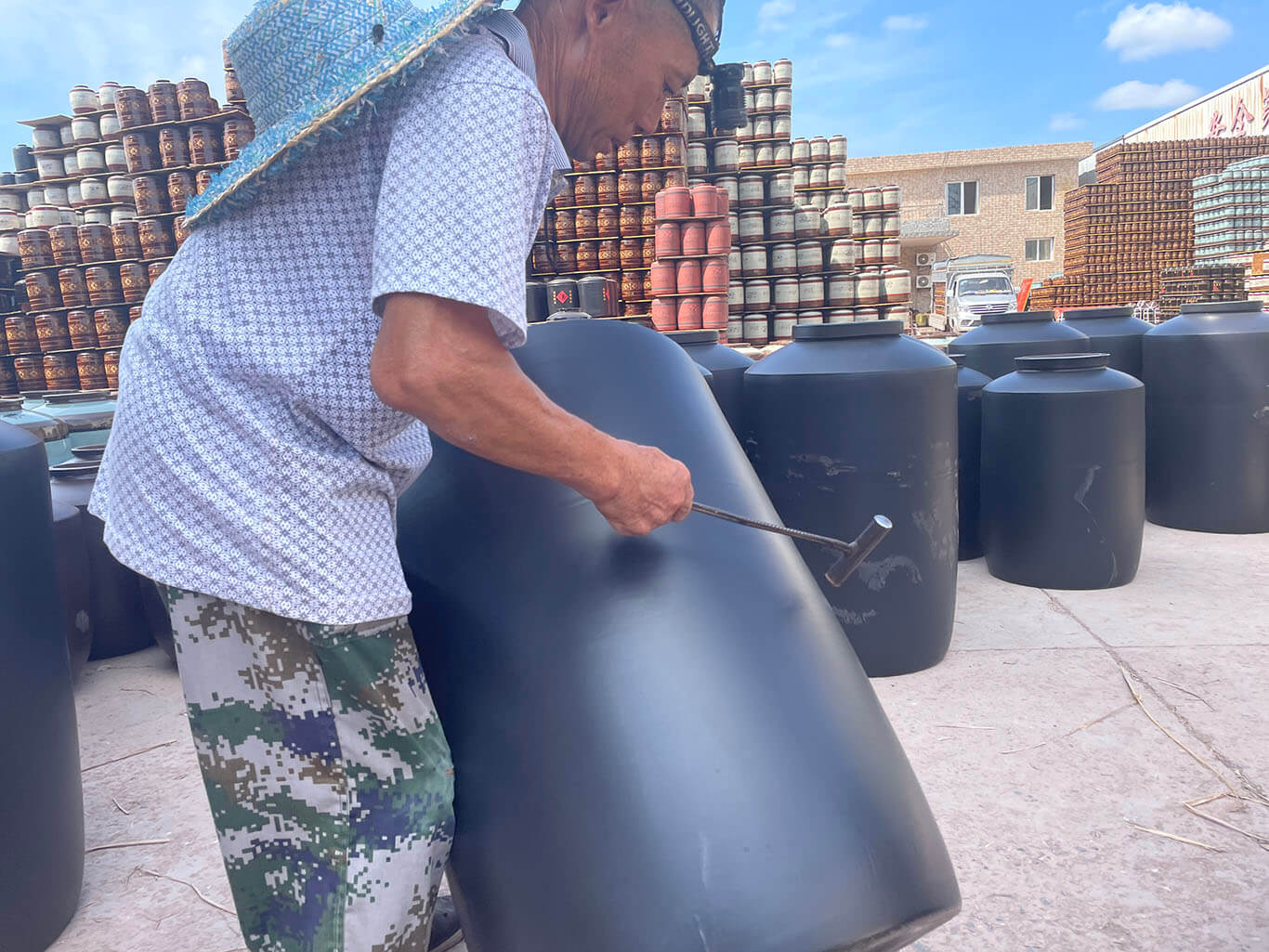 Craftsmen detect quality by tapping the sound emitted by the terracotta jar