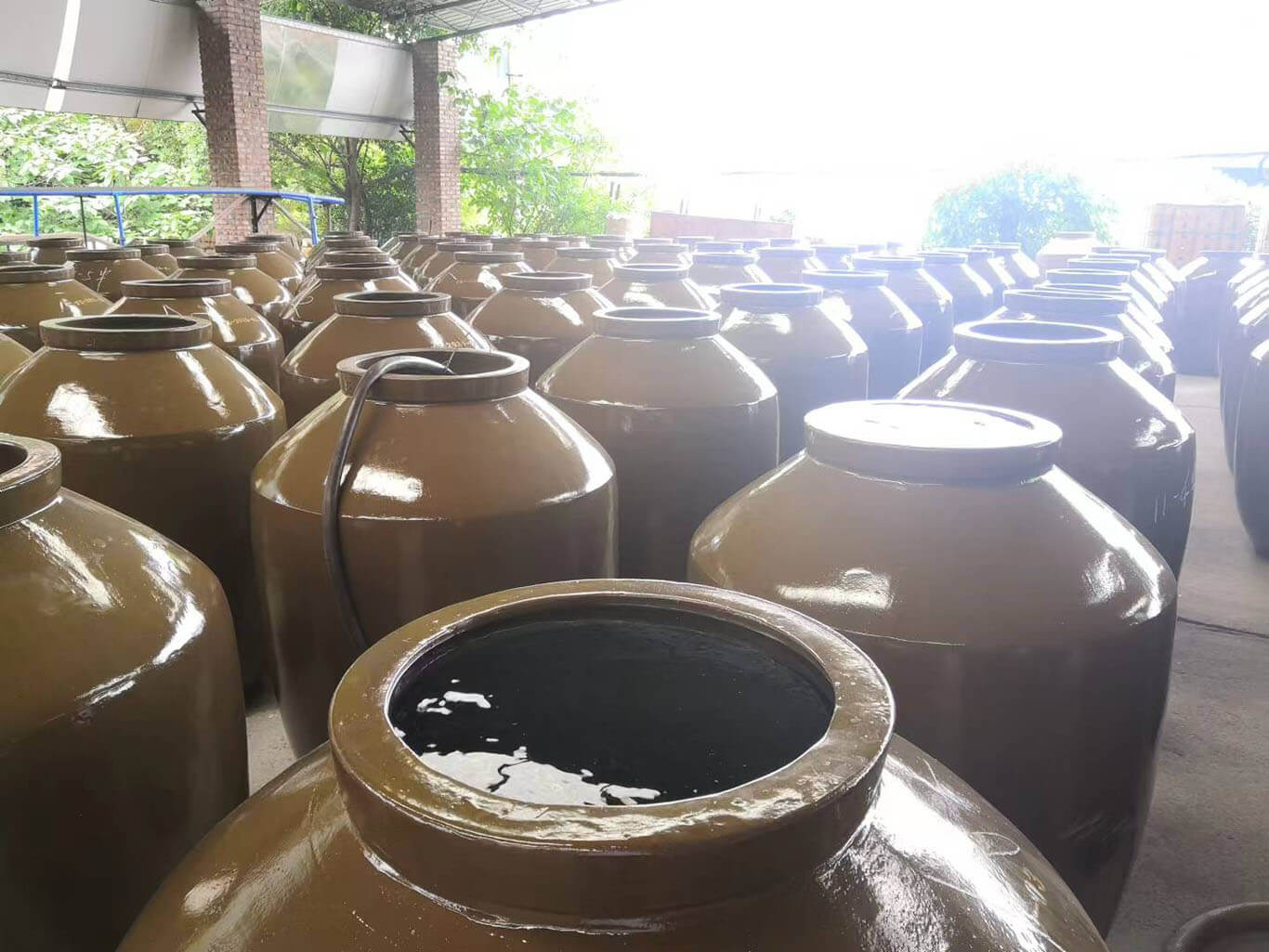 Finished terracotta jars undergo water leakage testing