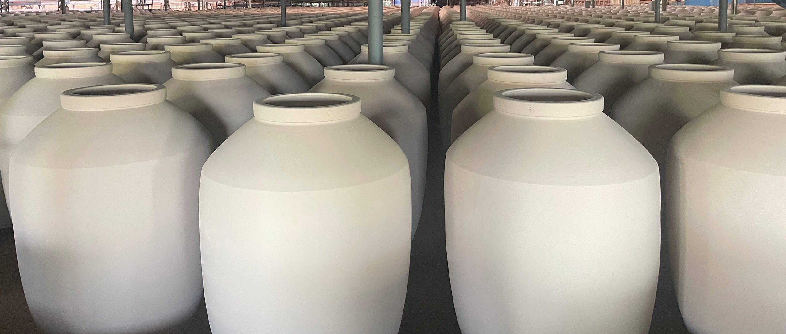 Large clay wine jars naturally dried in a drying room