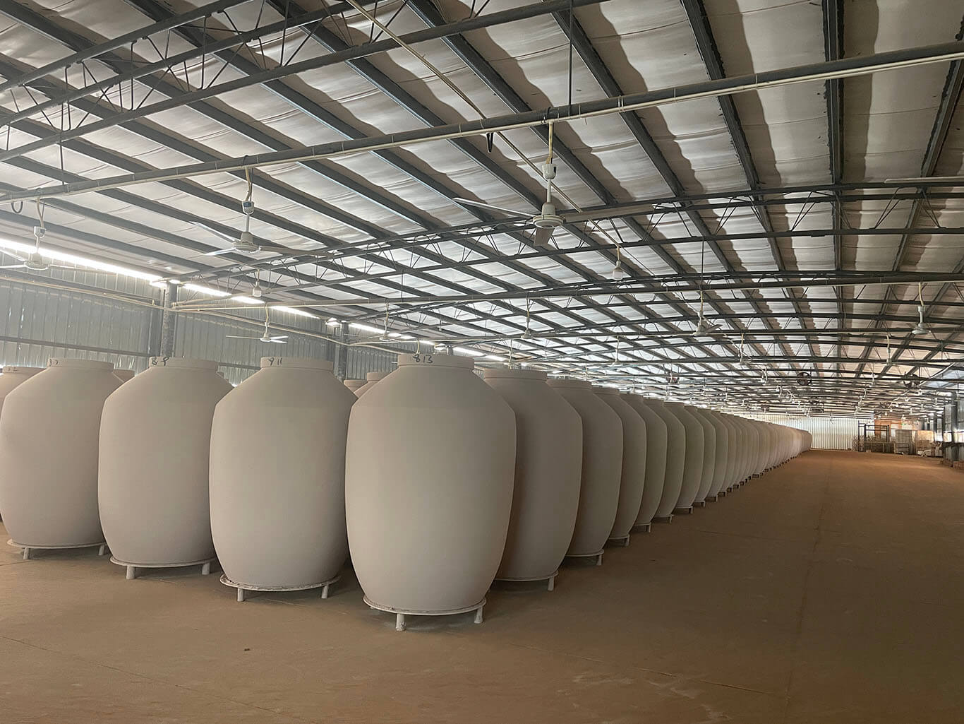 Natural drying clay terracotta jars in the drying room