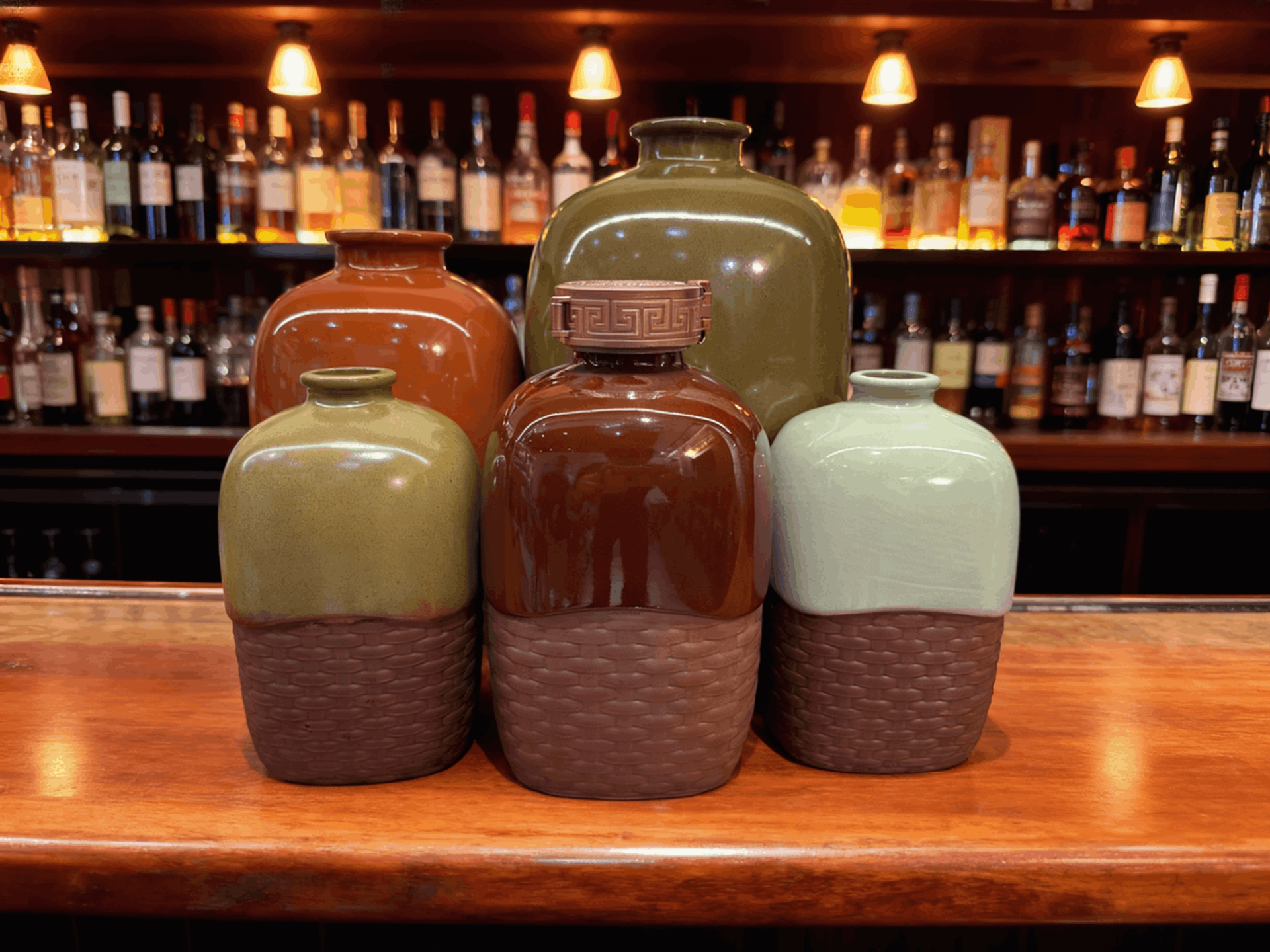 terracotta bottles of different styles used for high-end restaurants to hold wine