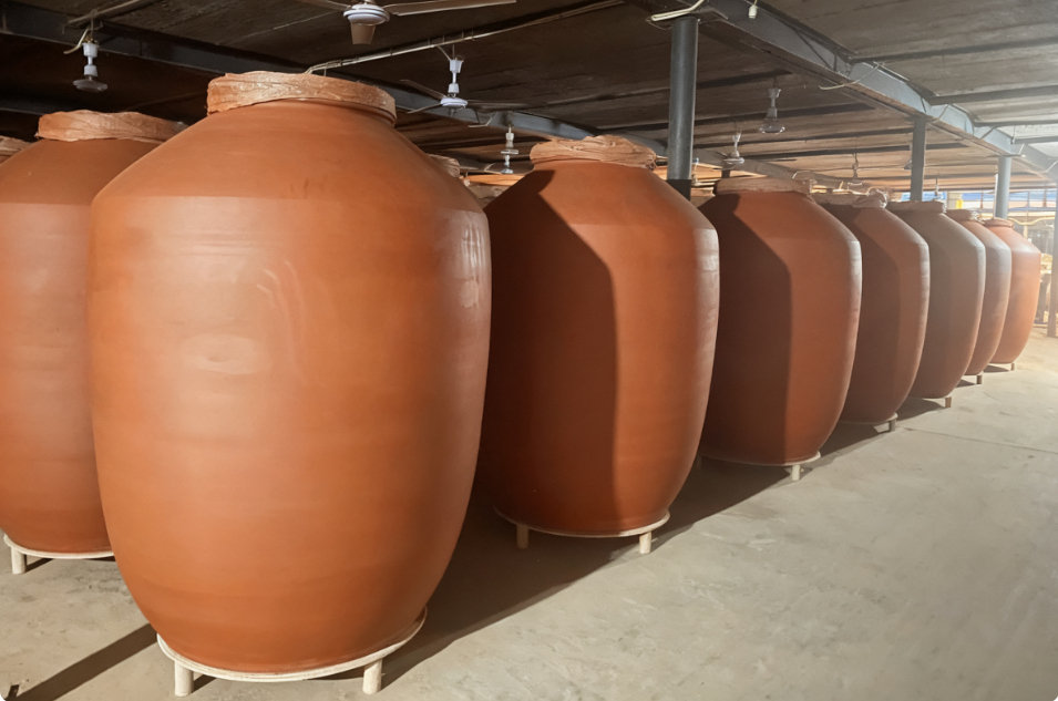 Unglazed wine jars in warehouse
