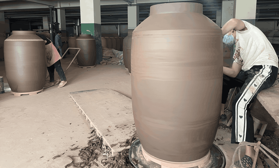 handmade wine amphora shaping compared to industrial production